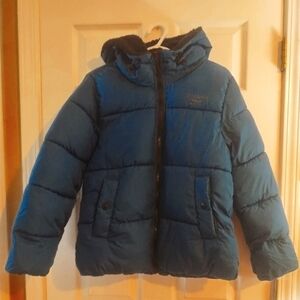 Reebok puffer jacket w/ hood lined w/ faux fur .